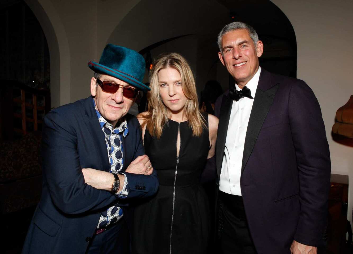 Musicians Elvis Costello, Diana Krall and Lyor Cohen, the latter of whom is Warner Music's North American chairman and CEO of recorded music.