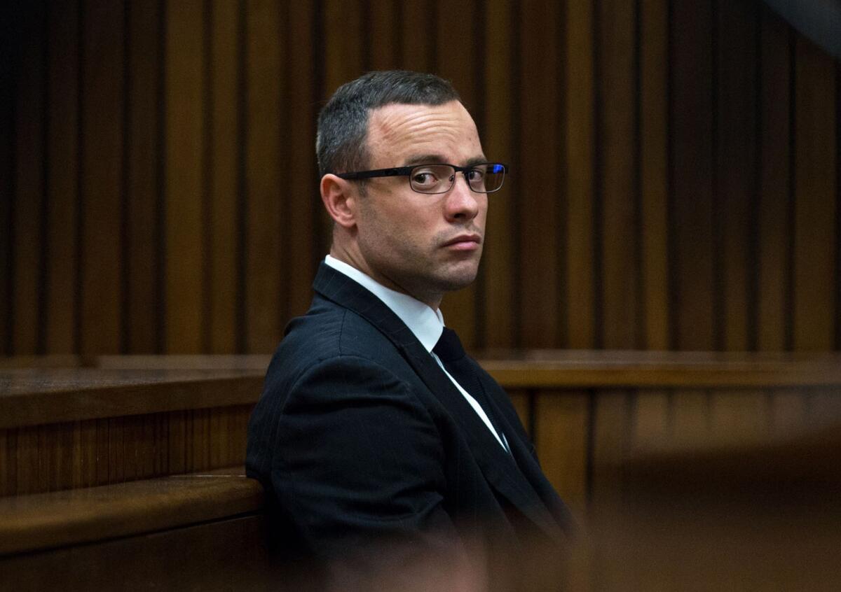 Oscar Pistorius sits in court on May 13, 2014, during his original trial in Pretoria, South Africa.