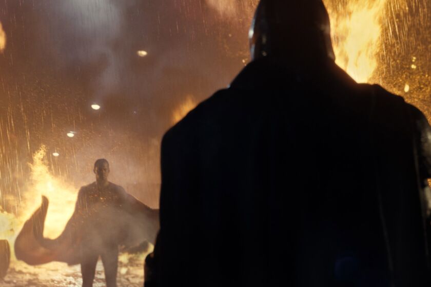 Henry Cavill as Superman, left, and Ben Affleck as Batman in Warner Bros. Pictures' "Batman v Superman: Dawn of Justice."