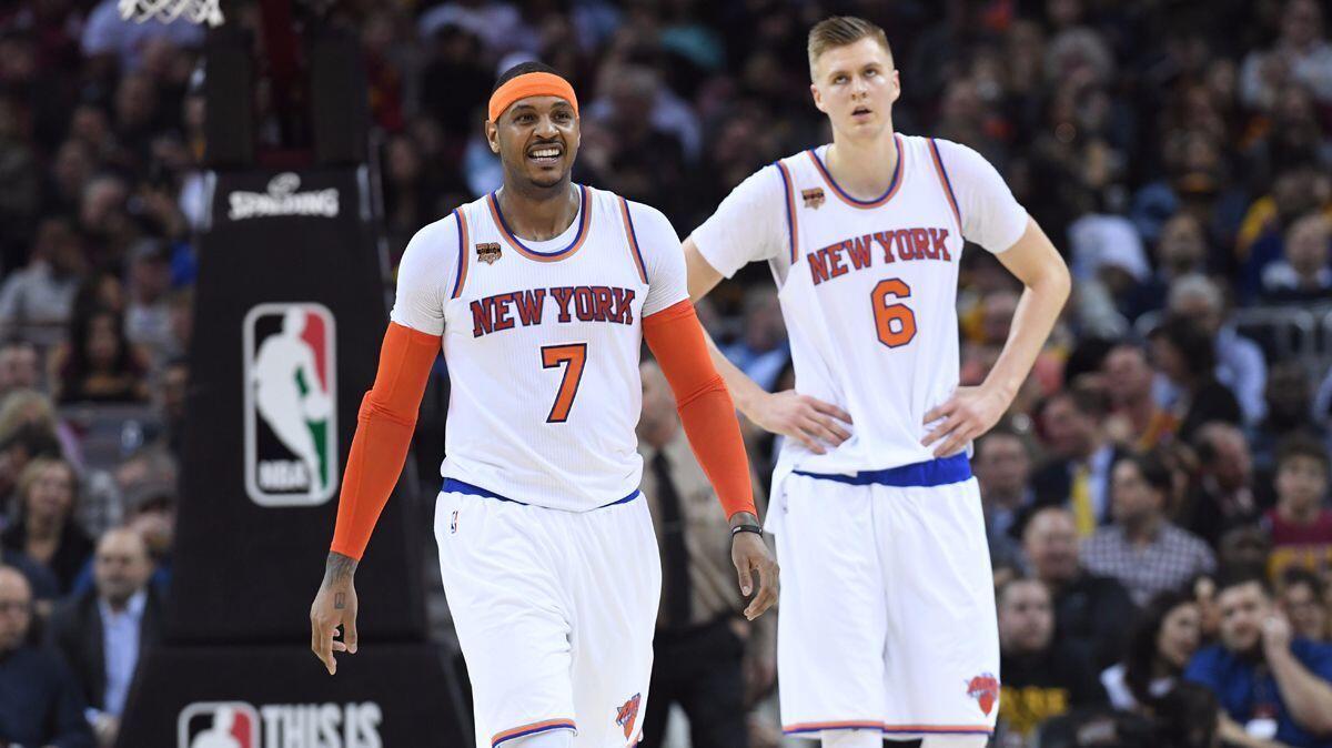 Despite all of the trade rumors, Carmelo Anthony, left, remained with the New York Knicks.