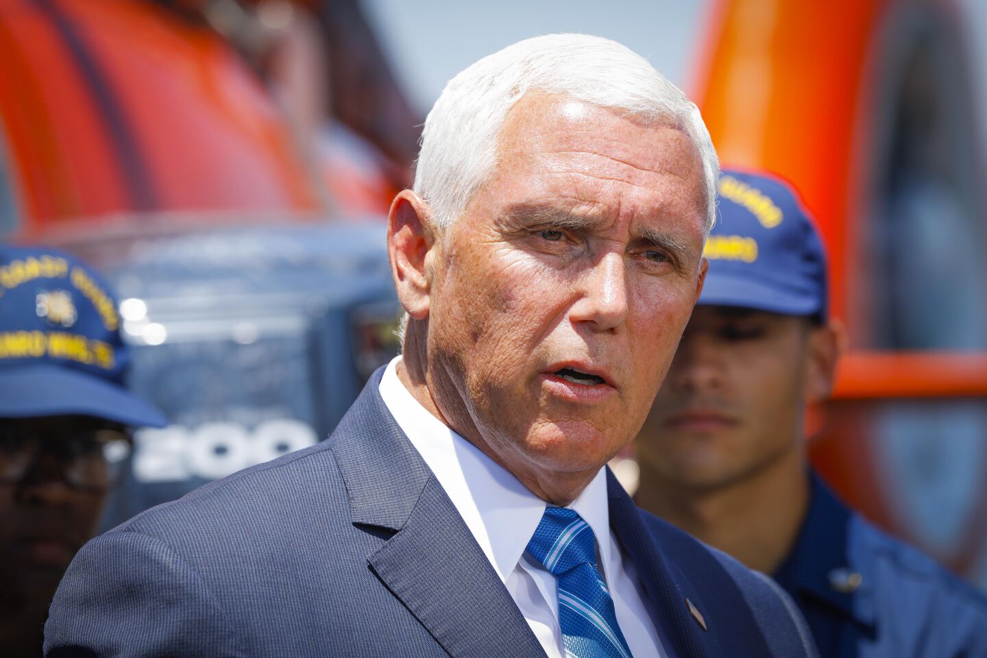 Vice President Mike Pence talks with reporters after delivering his remarks at Naval Air Station North Island aboard the U.S. Coast Guard cutter Munro, July 11, 2019, in Coronado, California during his first official trip to San Diego County since taking office.