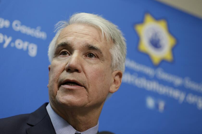 FILE - In this Dec. 9, 2014 file photo, San Francisco District Attorney George Gascon speaks during a news conference in San Francisco. The San Francisco top prosecutor says his office used high-tech to erase or reduced 8,000 marijuana convictions dating back decades, the first California prosecutor's office to publicly announce full compliance with clearing criminal records required when voters approved the broad legalization of pot. District Attorney George Gascon made the announcement Wednesday, Feb. 25, 2019, saying the nonprofit Code for America organization used computer-based algorithms to identify eligible cases. (AP Photo/Eric Risberg, File)