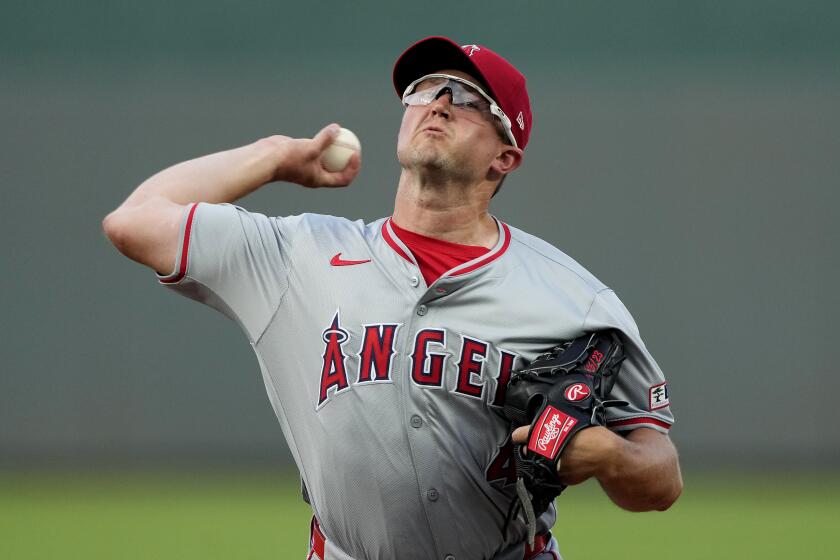 Los Angeles Angels starting pitcher Carson Fulmer throws during the first inning.