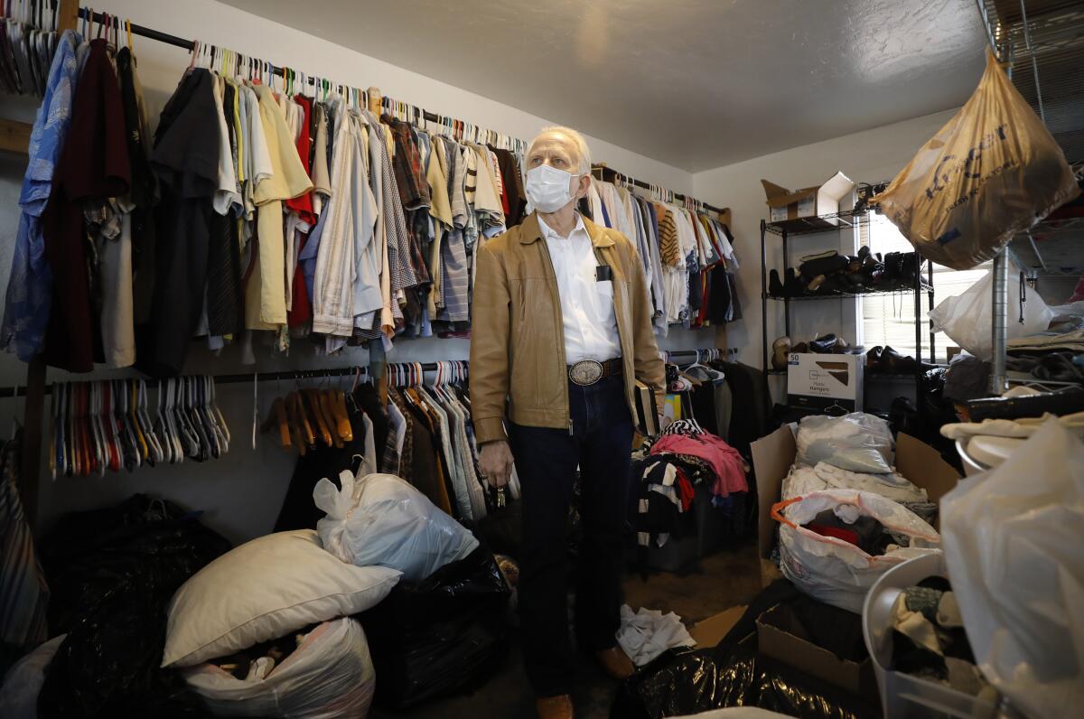 Ray Zeher stands in the clothes room at God's Extended Hand.