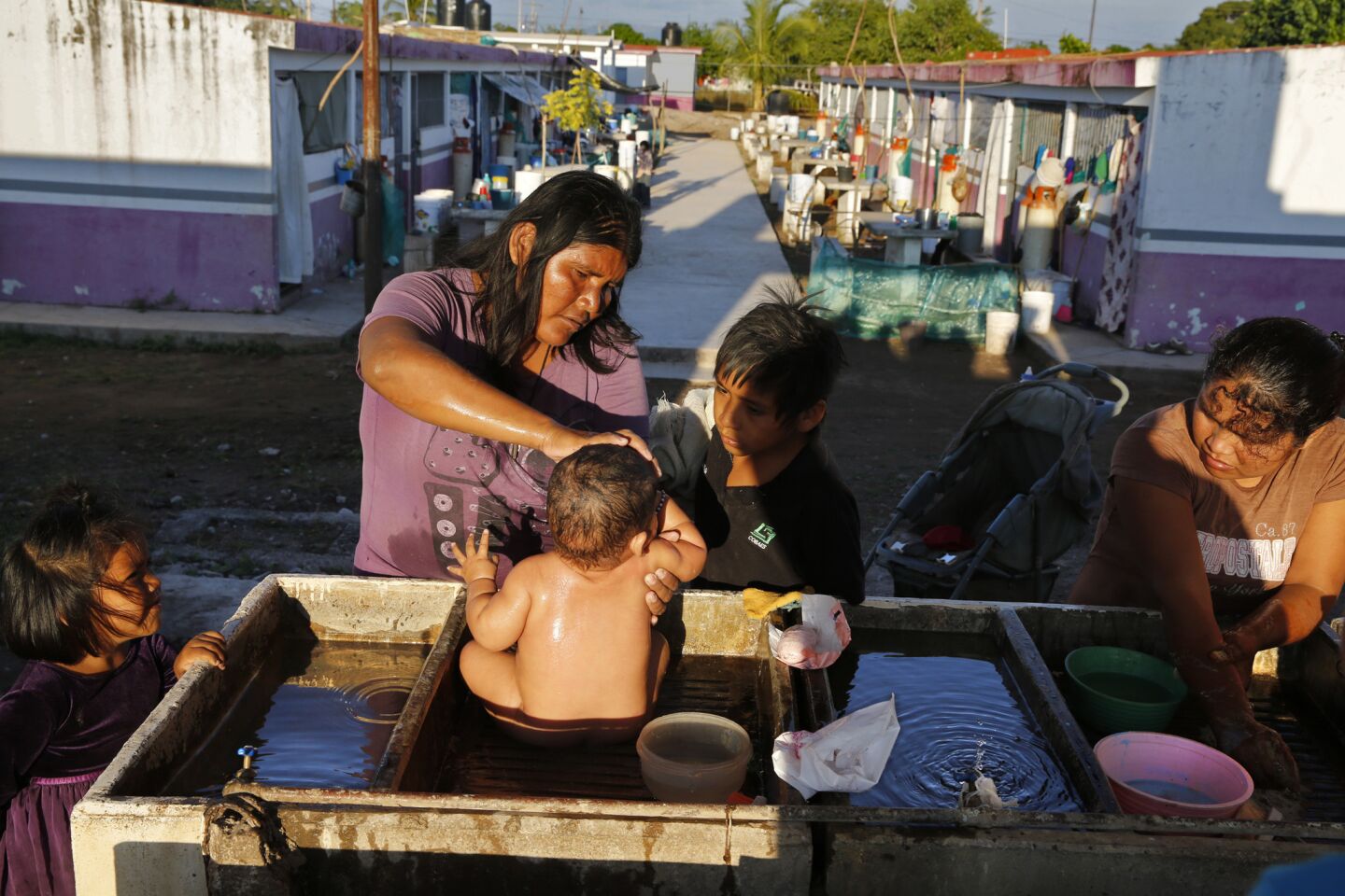 Mexico labor washing baby
