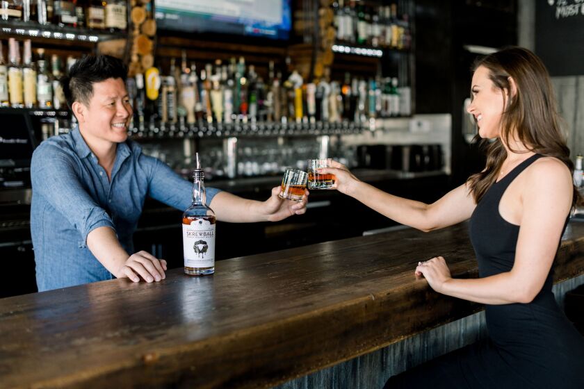 Skrewball Whiskey co-founders Steven Yeng and Brittany Merrill Yeng of Ocean Beach are planning two major charitable efforts to support laid-off hospitality workers.