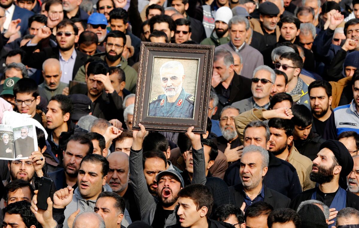 Iranians take to the streets of Tehran to mourn the death of  Qassem Suleimani.