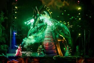 Mickey Mouse tangles with a fire-breathing dragon in the Disneyland show "Fantasmic!"