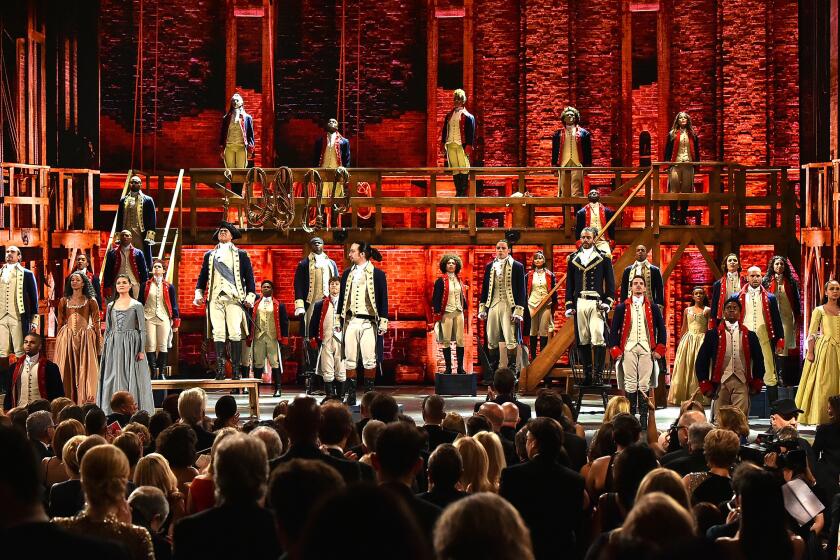 The cast of "Hamilton" performs onstage during the 70th Annual Tony Awards at The Beacon Theatre on June 12 in New York City.