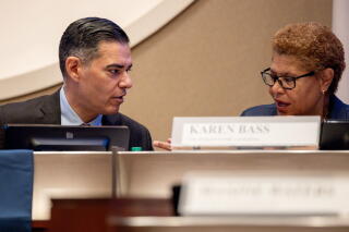 Rep. Robert Garcia speaks with Los Angeles Mayor Karen Bass