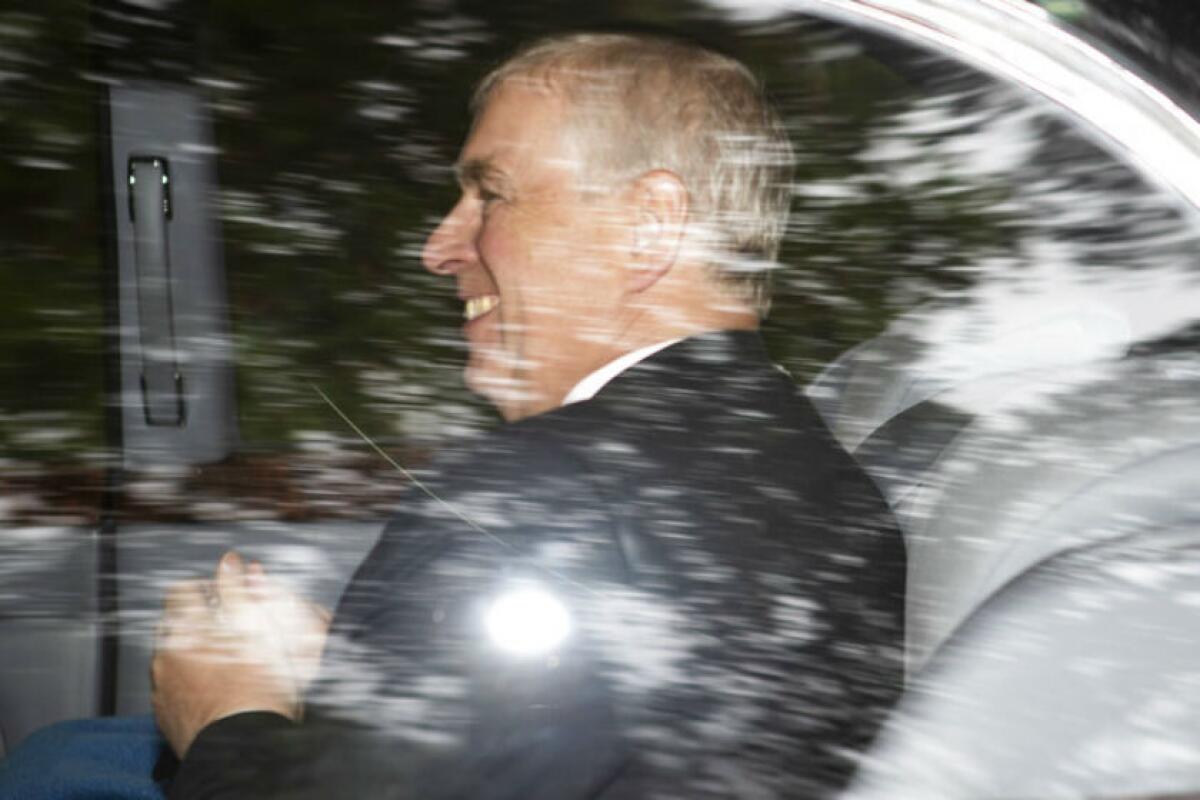 Britain's Prince Andrew leaves a church in Crathie, Scotland, after a Sunday morning service.