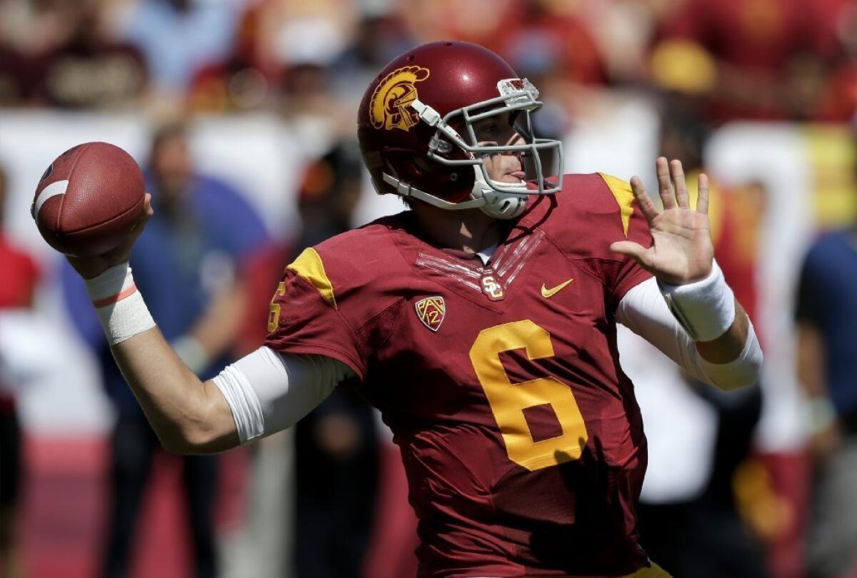 USC quarterback Cody Kessler led USC to a 35-7 victory over Boston College but would like to have one pass back.