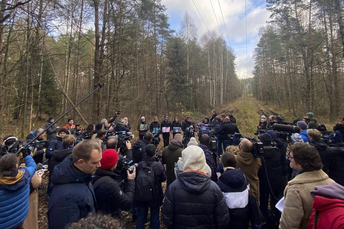 Polish border activists gathering in forest