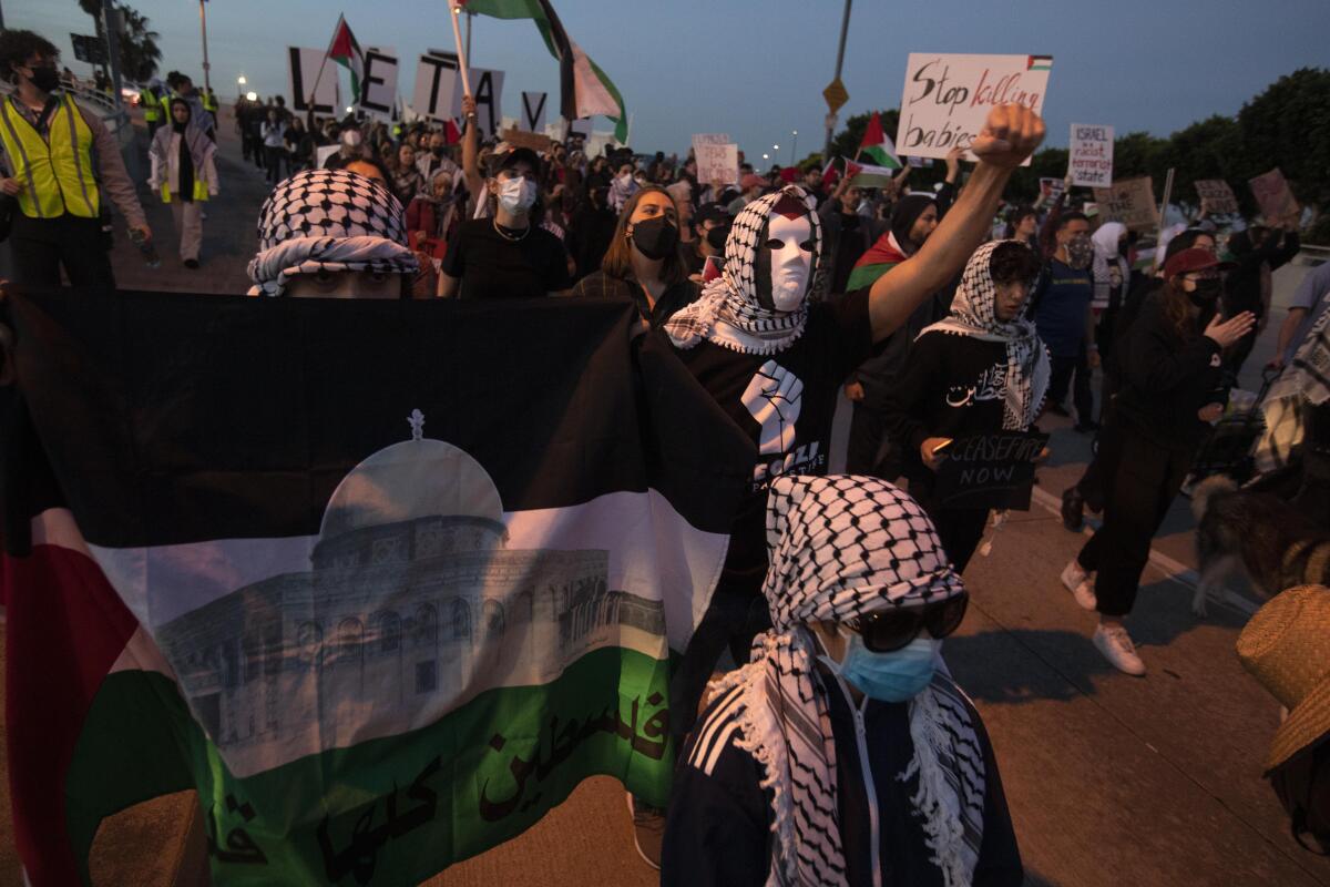 Protesters push for a cease-fire in Gaza on Friday near LAX.