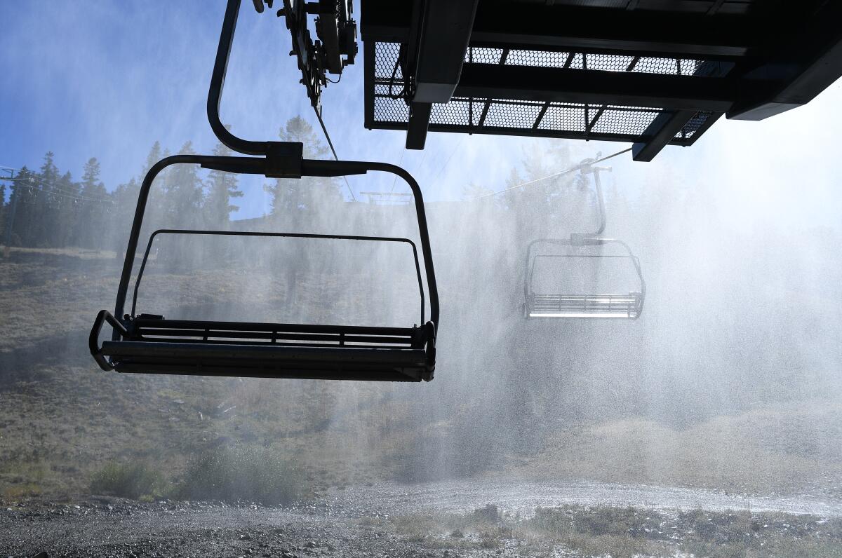Ski lift chairs enshrouded in mist
