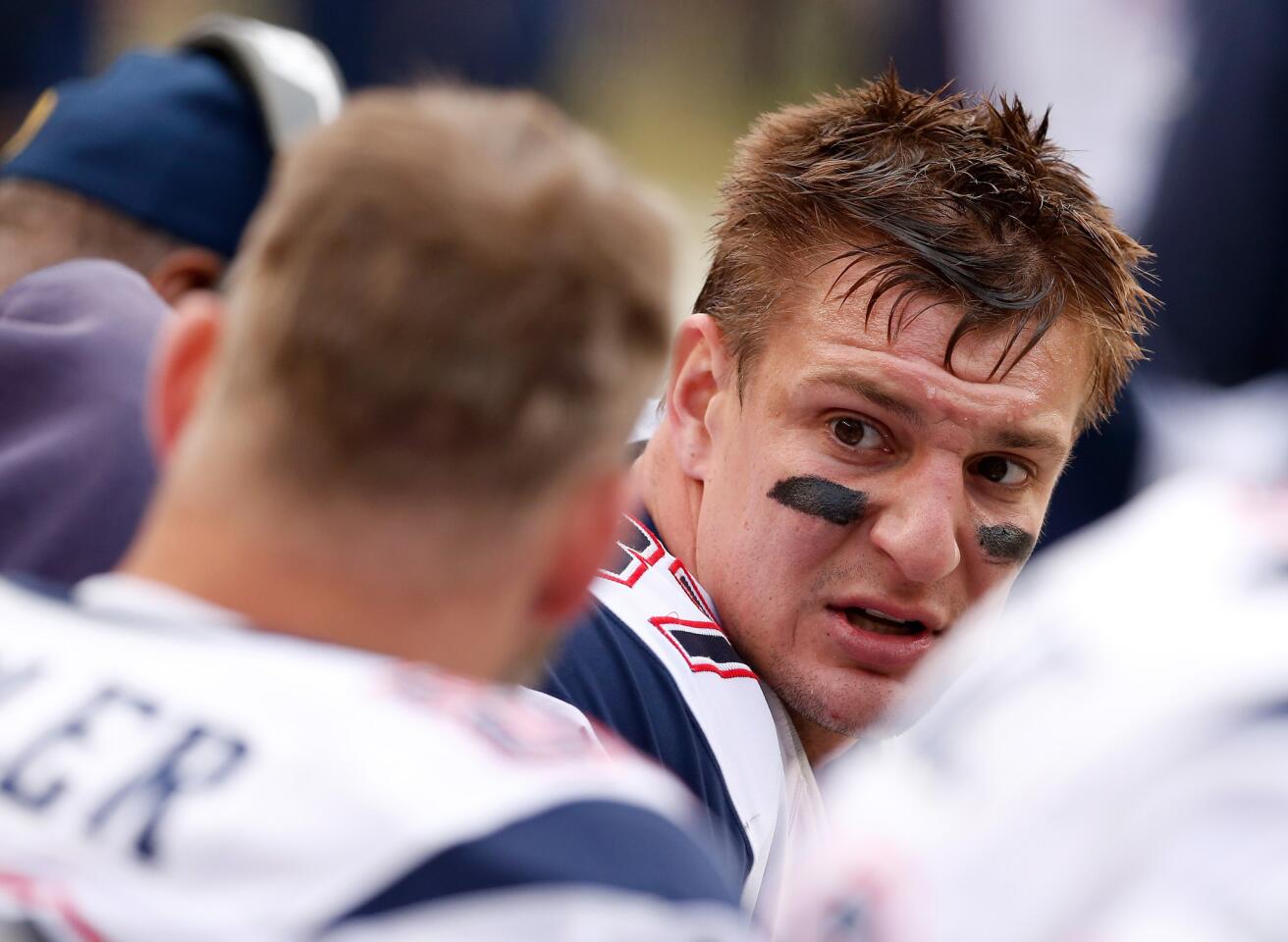 Patriots tight end Rob Gronkowski looks on from the sideline during the first half of the AFC Championship game against the Broncos on Jan. 24.