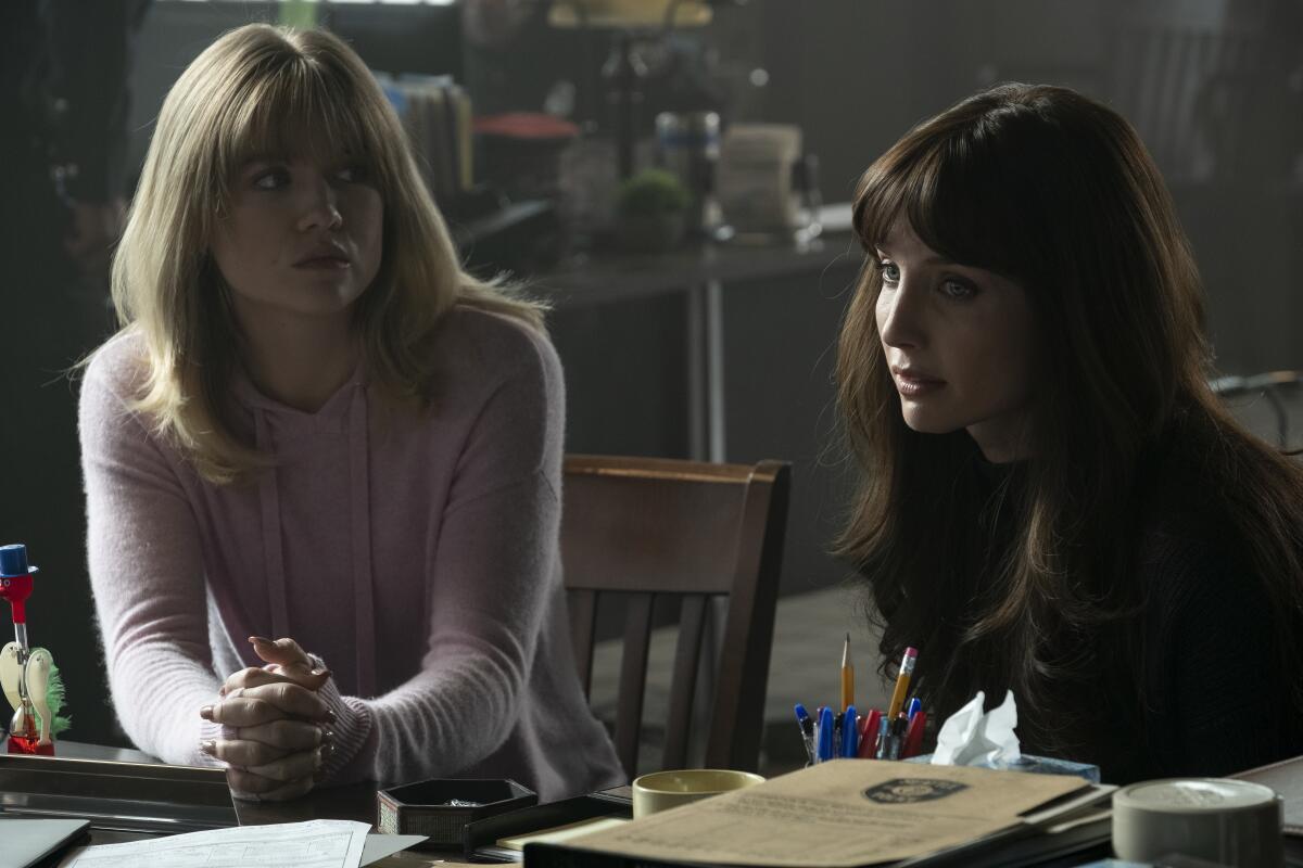 This image released by Warner Bros. Entertainment shows Maddie Hasson, left, and Annabelle Wallis in a scene from "Malignant." (Warner Bros. via AP)