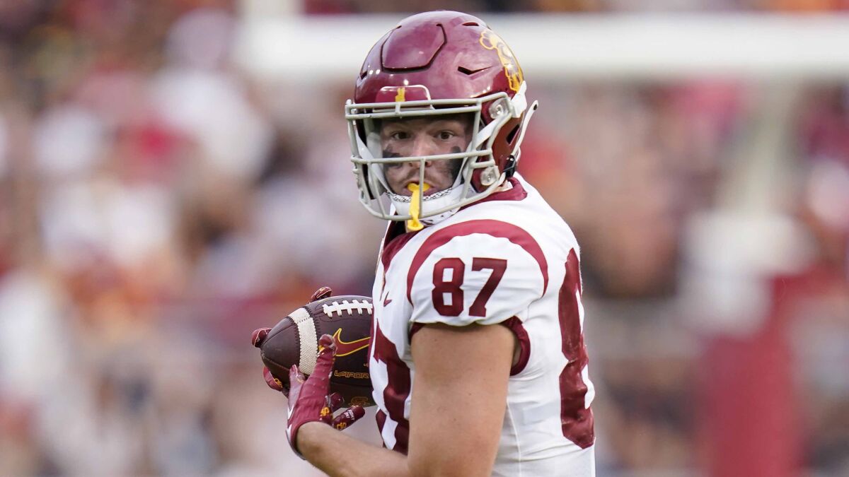 USC tight end Lake McRee runs after making a catch against Stanford on Sept. 10.