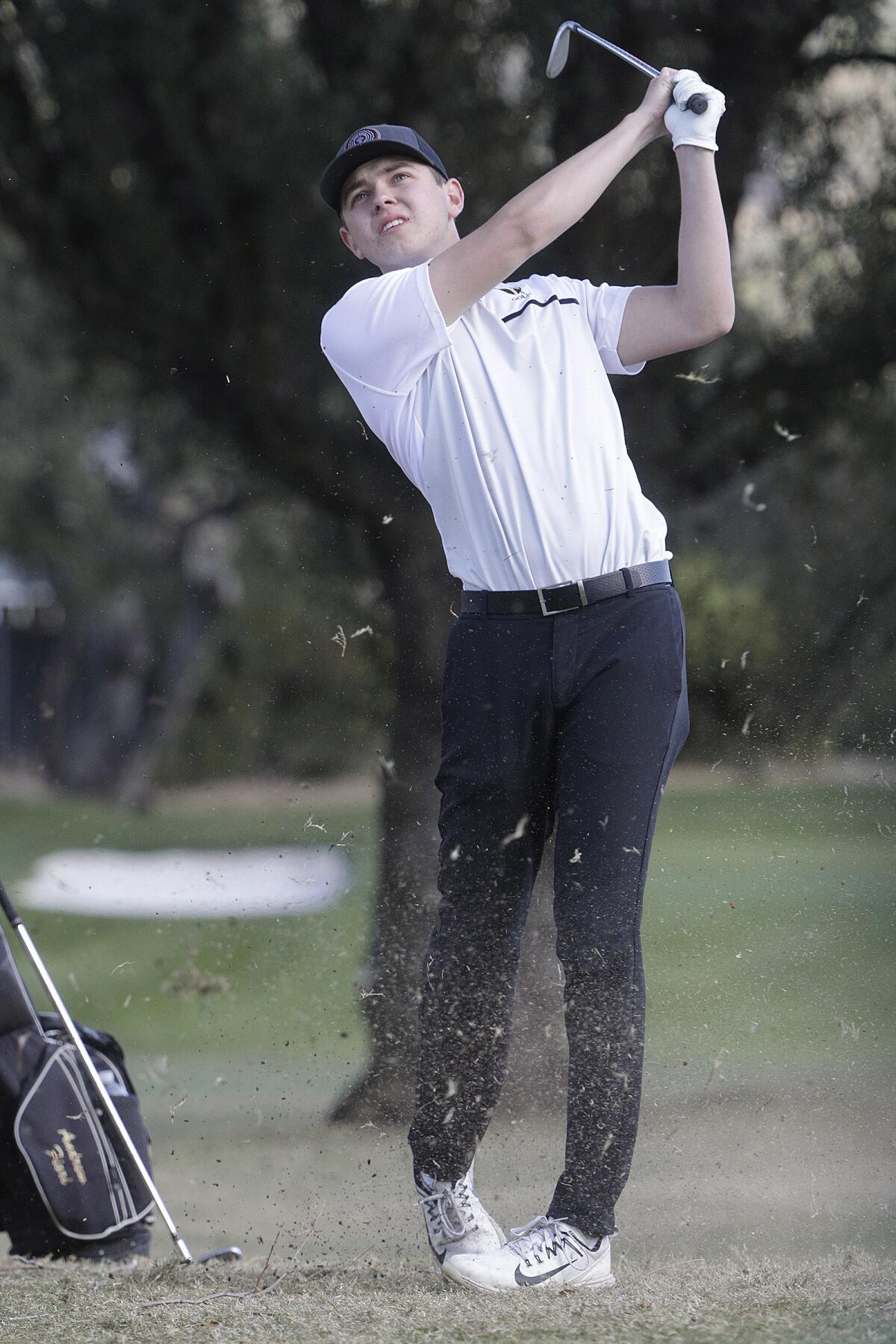 St. Francis' Andrew Fiori hits a shot out of the rough on the fourteenth fairway in the third annual Oakmont High School Golf Invitational at Oakmont Country Club in Glendale on Monday, March 2, 2020. Twenty-two high schools, some with more than one team, participated in the annual event