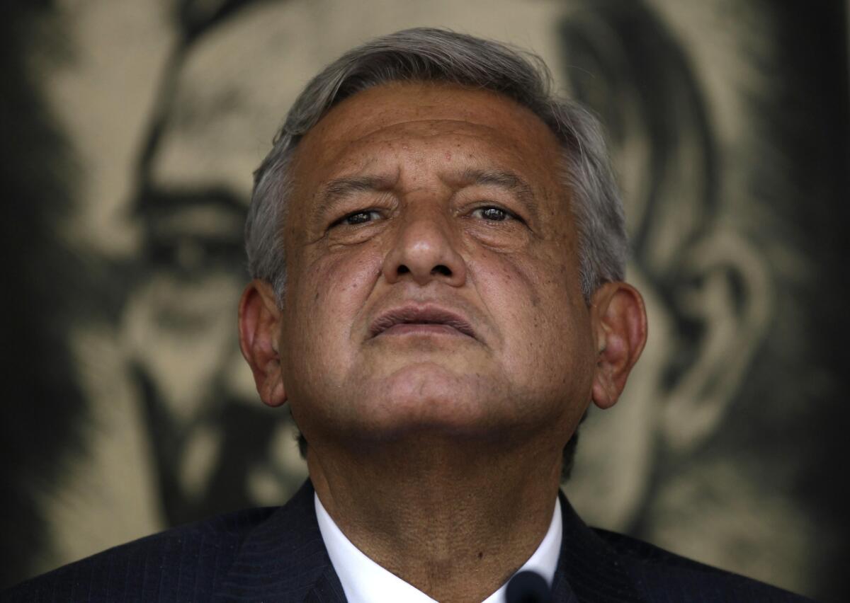 Andres Manuel Lopez Obrador, then a presidential candidate for the Democratic Revolution Party, speaks during a news conference in Mexico City.