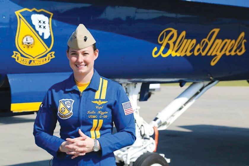 Marine Capt. Katie Higginsis the first female pilot with the U.S. Navy Flight Demonstration Squadron, or Blue Angels. The Severna Park, Md., native, is now the newest pilot of "Fat Albert," a C-130 Hercules flown by the Blue Angels. (U.S. Marine Corps photo by Lance Cpl. Olivia G. Ortiz/Released)