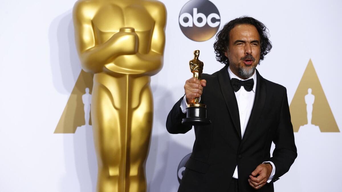 Alejandro G. Inarritu with his Oscar for directing for the film "The Revenant."