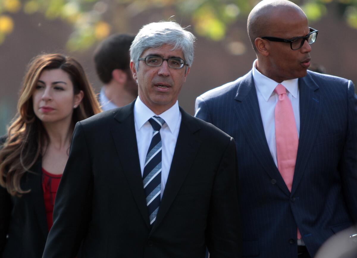 The legal team representing plaintiffs in the case in 2014 included Theodore Boutrous, center, and Marcellus McRae, right. The case was filed on behalf of nine students.