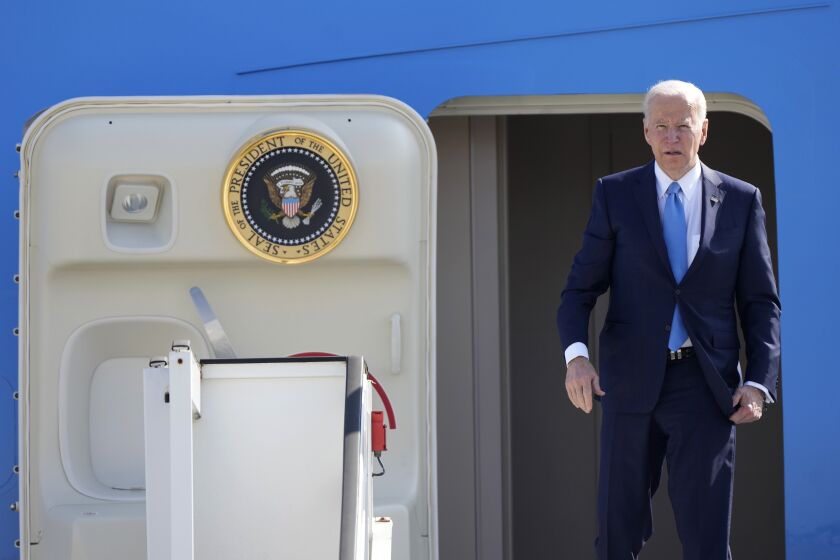 U.S. President Joe Biden boards Air Force One at Melsbroek military airport in Brussels, Friday, March 25, 2022. U.S. President Joe Biden heads to Poland on Friday for the final leg of his four-day trip as he tries to maintain unity among allies and support Ukraine's defense. (AP Photo/Markus Schreiber)