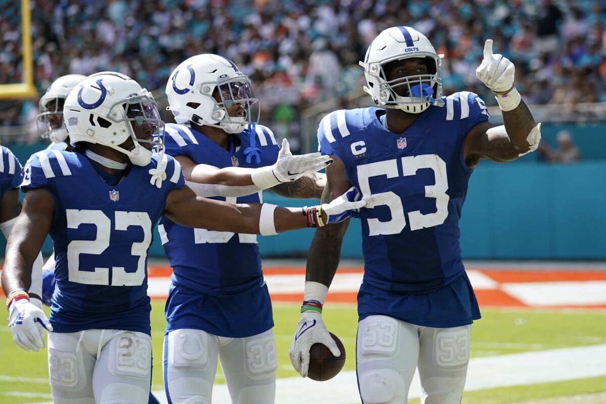 Indianapolis Colts outside linebacker Darius Leonard (53) celebrates a fumble recovery during the second half of an NFL football game against the Miami Dolphins, Sunday, Oct. 3, 2021, in Miami Gardens, Fla. (AP Photo/WIlfredo Lee)