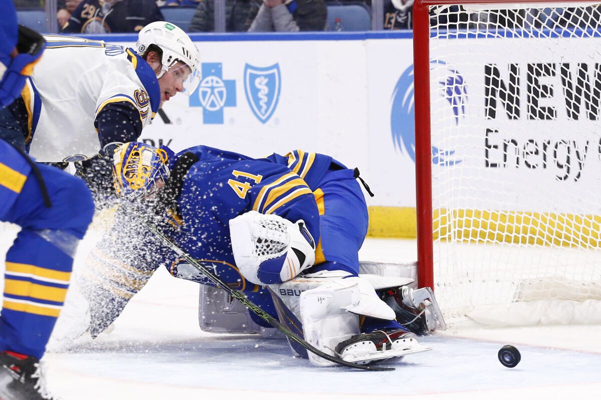 St. Louis Blues right wing Vladimir Tarasenko puts the puck past Buffalo Sabres goaltender Craig Anderson (41) for a goal during the second period of an NHL hockey game Thursday, April 14, 2022, in Buffalo, N.Y. (AP Photo/Jeffrey T. Barnes)