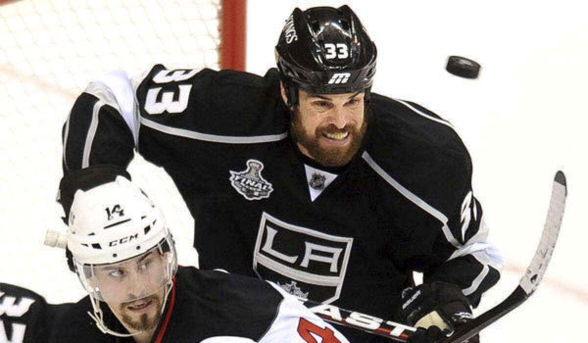 Kings defenseman Willie Mitchell, shown during the 2012 Stanley Cup final, played in Saturday's scrimmage at El Segundo after missing all of last year because of an injured knee.