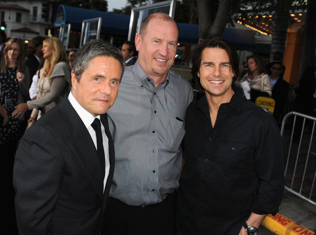 Paramount Pictures Chairman Brad Grey, left, with former Vice Chairman Rob Moore and actor Tom Cruise in 2011. Moore was fired on Friday