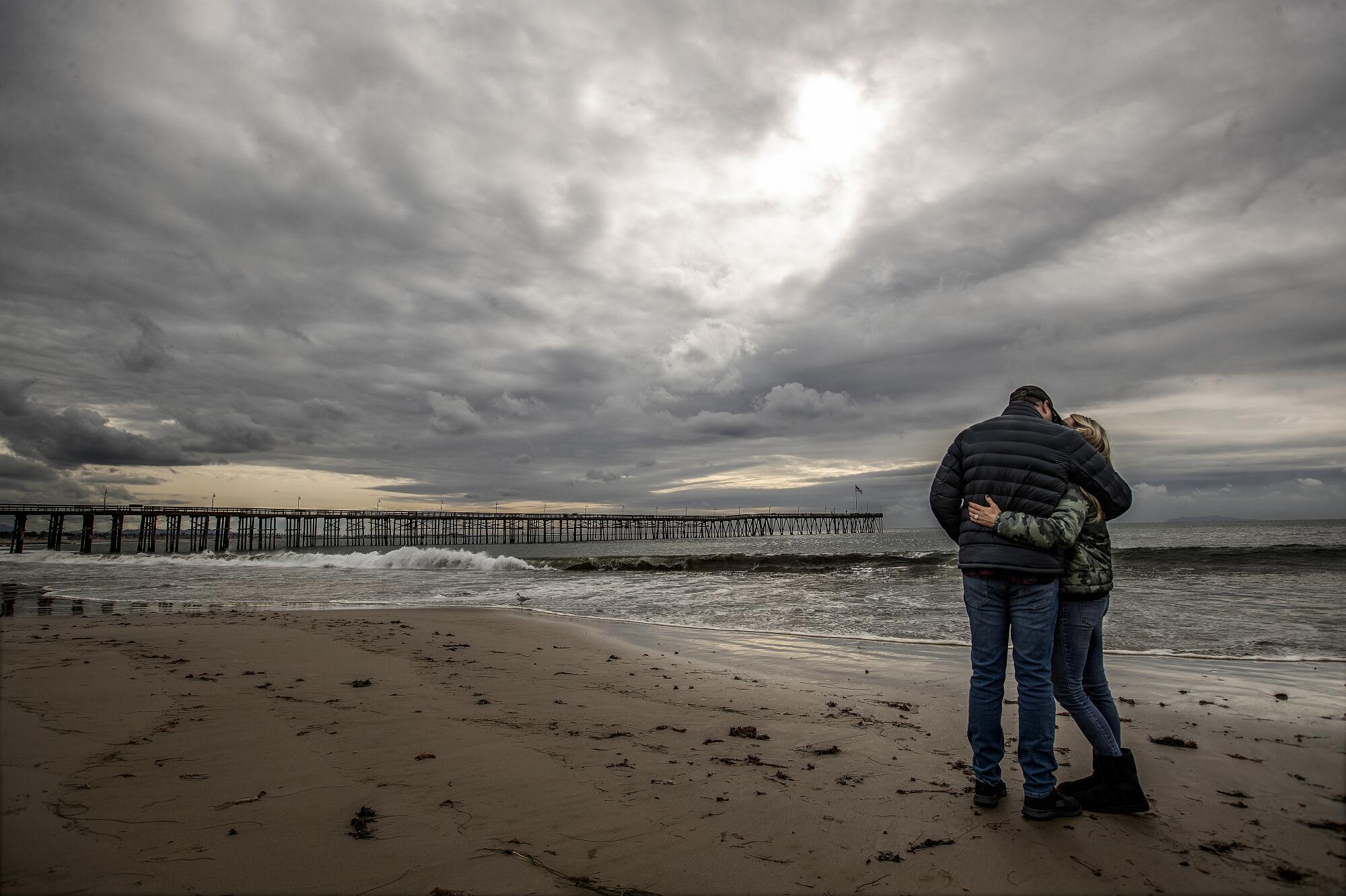 A couple on the beach.