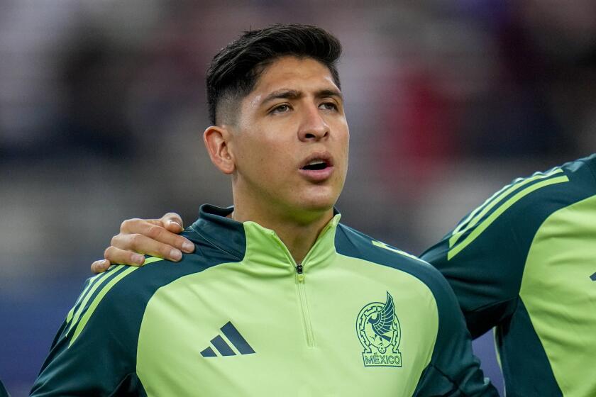 Mexico's Edson Alvarez stands during the playing of the national anthem prior to a CONCACAF Nations League championship soccer match between Mexico and the United States, Sunday, March 24, 2024, in Arlington, Texas. (AP Photo/Julio Cortez)