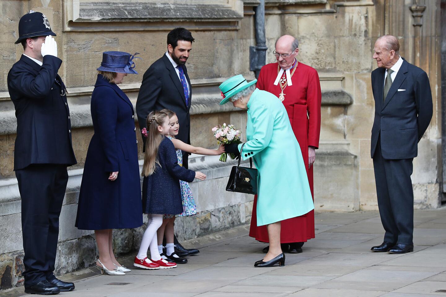 Queen Elizabeth II and Prince Philip leave St. George's Chapel at Windsor Castle on April 16 after Easter service.