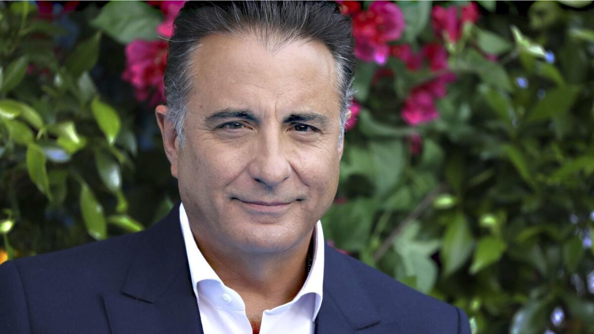 Actor Andy Garcia poses for photographers upon arrival at the world premiere of the film "Mamma Mia! Here We Go Again," in London Monday, July 16, 2018.