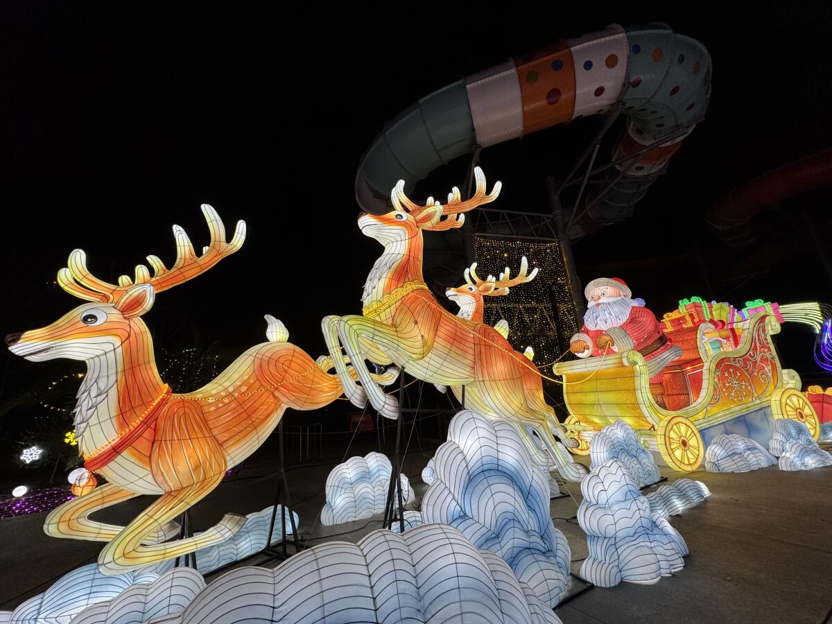 The festival features Santa Claus on his sleigh with reindeer.