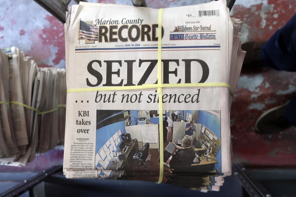 Copes of the Marion County Record, with the headline, "Seized... but not silenced."  