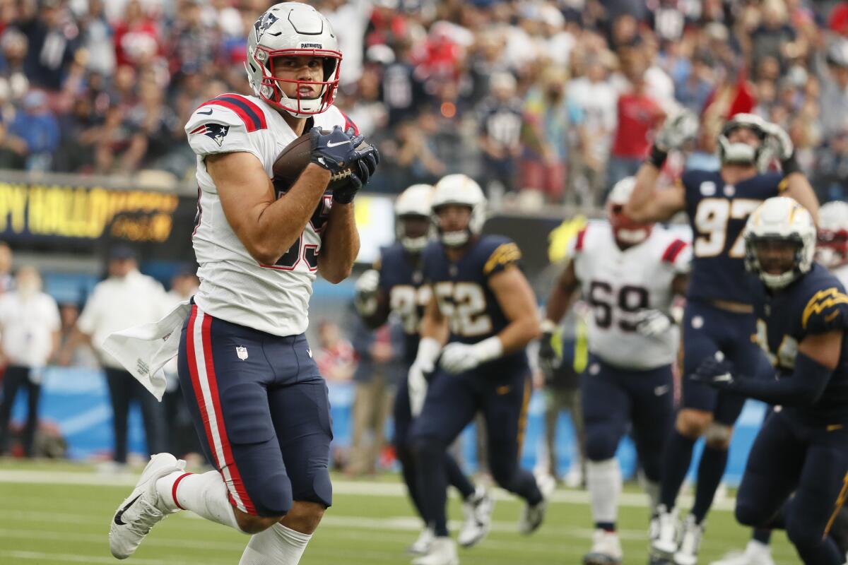 New England Patriots tight end Hunter Henry catches a long pass in the second quarter against the Chargers.