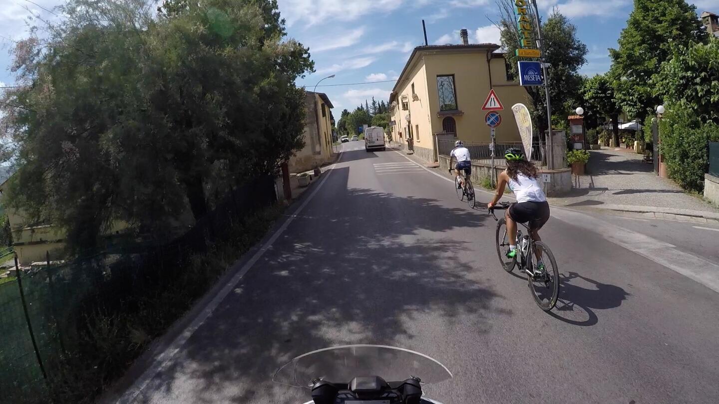 Riding through Greve in Chianti on SR 222.