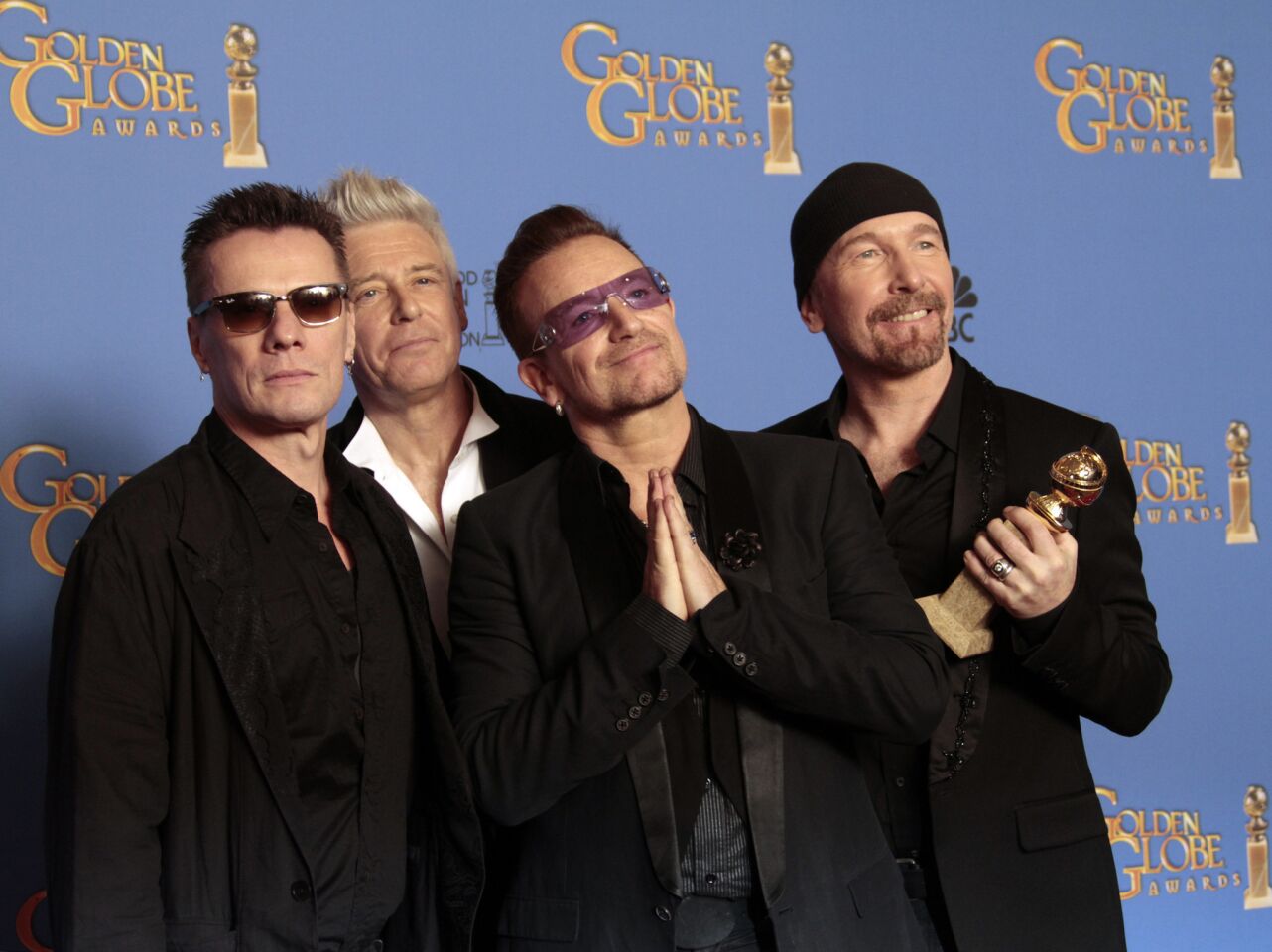 The Hollywood Foreign Press Assn. has a staunch defender in Bono, who seemed to urge reporters backstage at the Golden Globes on Sunday to take the award ceremony more seriously. "We kind of laugh about the foreign language press, [but] we have values in European cinema," the U2 frontman said after their original song "Ordinary Love" was named the best of the year. "We see things differently. It's just a different aesthetic. I think the Golden Globes is really important for that." Writing a song for "Mandela: Long Walk to Freedom": Bono recalled spending time on Robben Island with Mandela, "hearing his voice crack" as he recalled his experience being imprisoned for 18 years there. "He's so stoic and so kind of dismissive of his own pain," Bono said. "I'm not sure if you know this, but Mr. Mandela -- from cutting rocks on Robben Island with salt -- had lost use of his tear ducts. So this great man -- through all this historical drama -- was unable to cry."