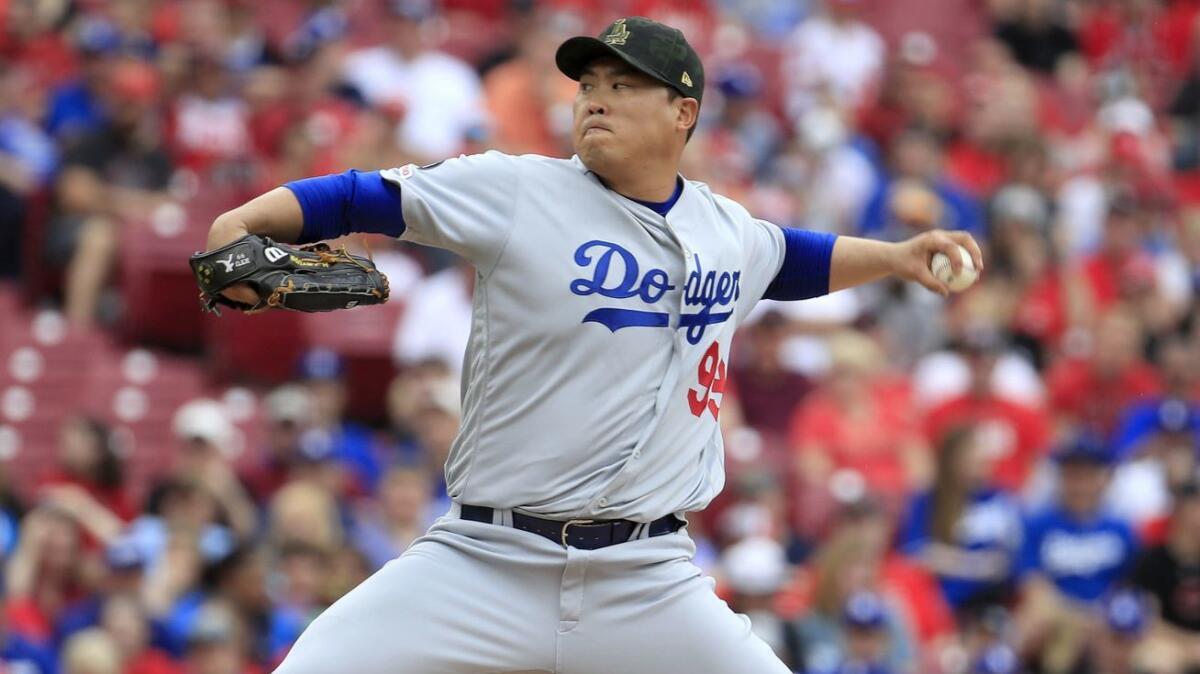 Dodgers starter Hyun-Jin Ryu, shown on the mound Sunday against the Cincinnati Reds, lowered his ERA to an NL-best 1.52.