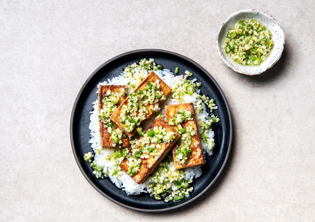 Sizzling ginger scallion sauce with pan-seared tofu