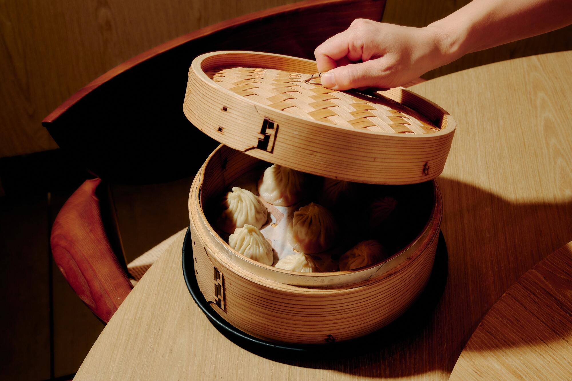 A steamer of chicken-filled soup dumplings called guan tang bao at Good Alley in Rosemead, Calif.