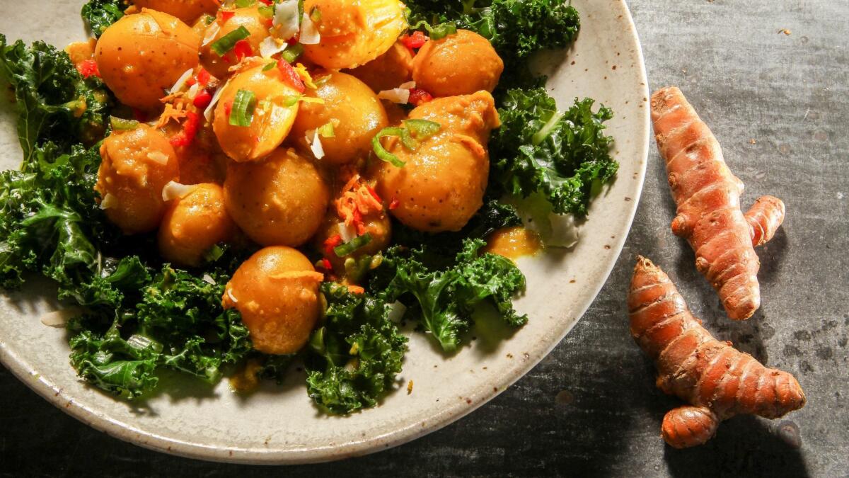 Turmeric-braised baby potatoes with coconut kale.