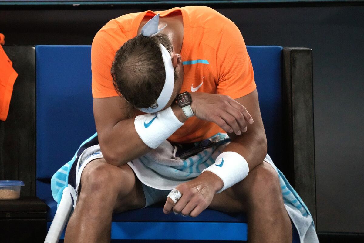 Tennis player Rafael Nadal resting his head on his arm