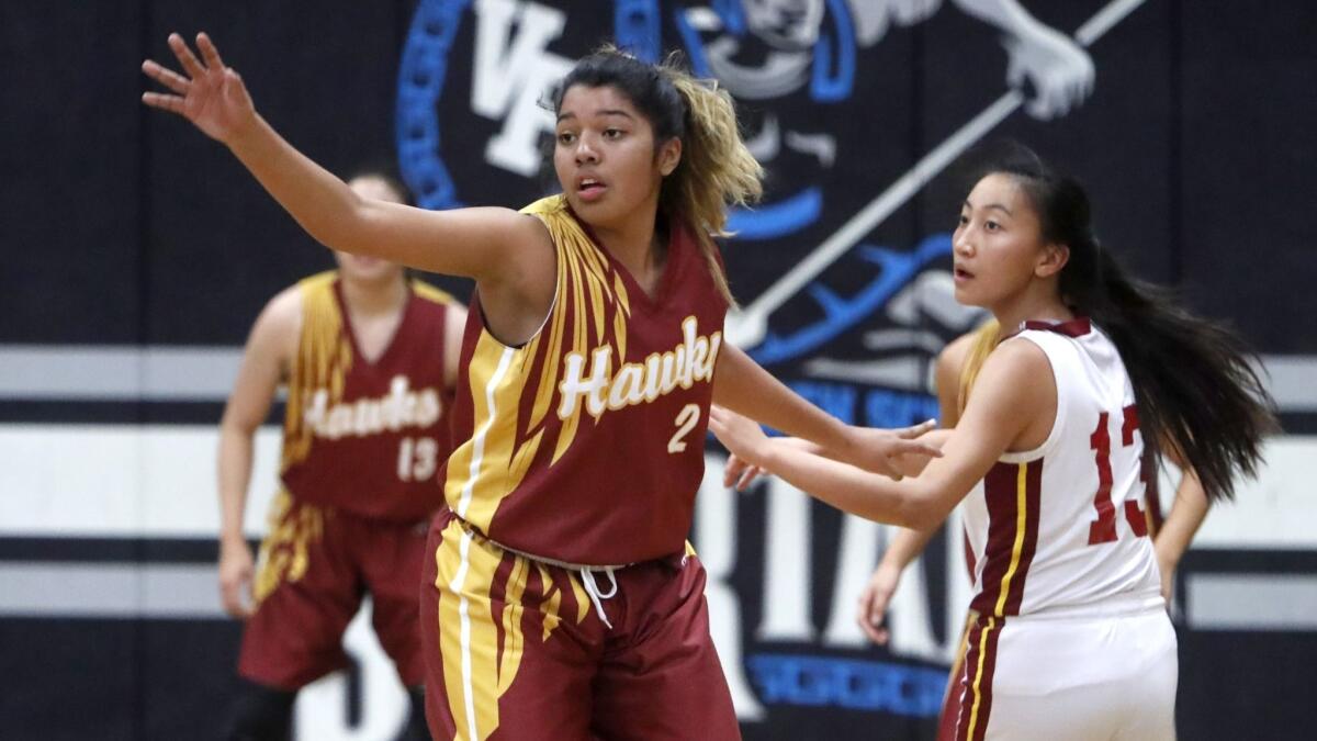 Ocean View High's Kasey Torres, shown playing defense against El Modena on Dec. 19, 2017, led the Seahawks with seven points in their season-opening loss at Saddleback.