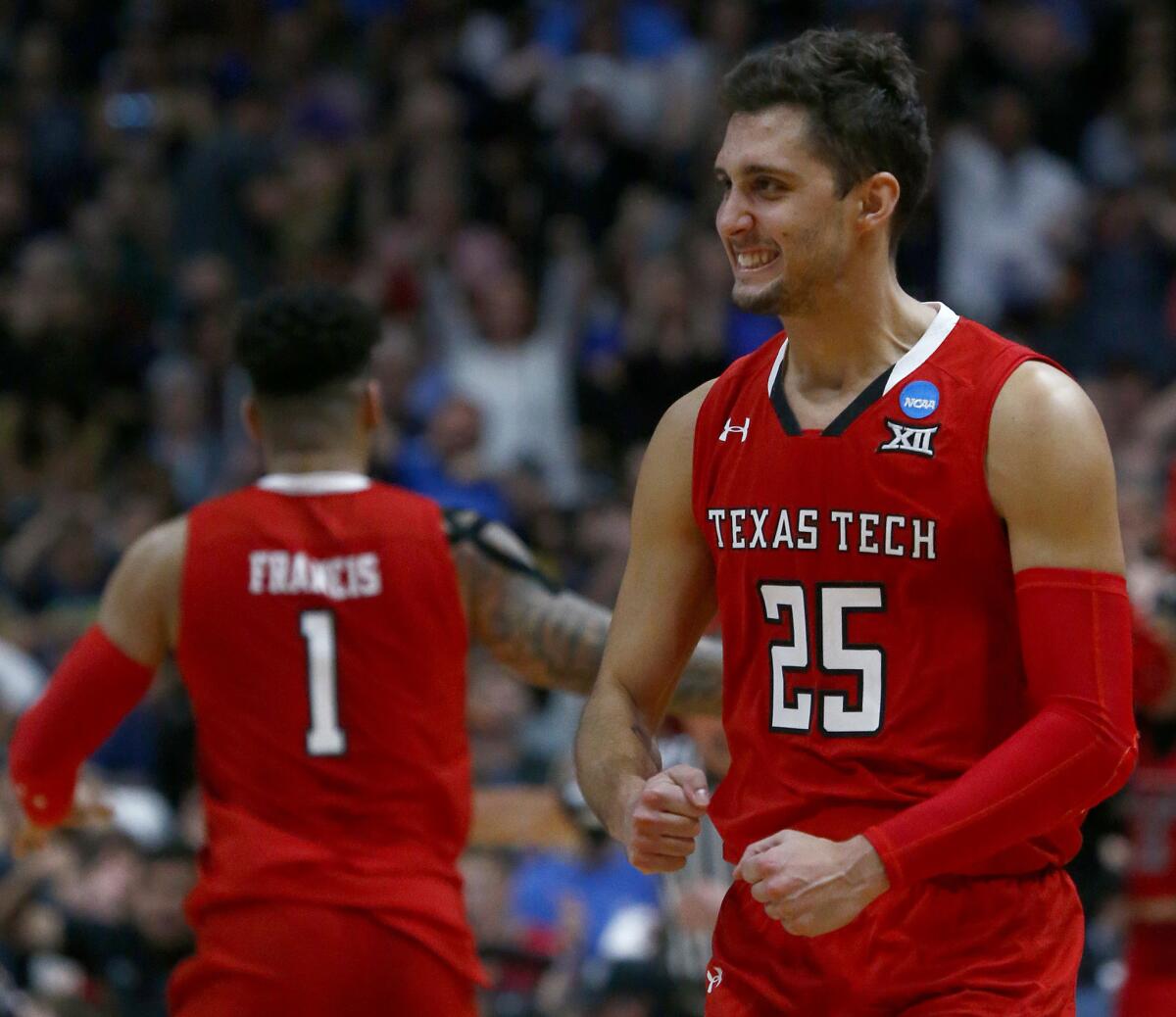 Texas Tech guard Davide Moretti celebrates after making a three-point shot against Gonzaga in the second half of the NCAA tournament West Regional Final at the Honda Center on Saturday.