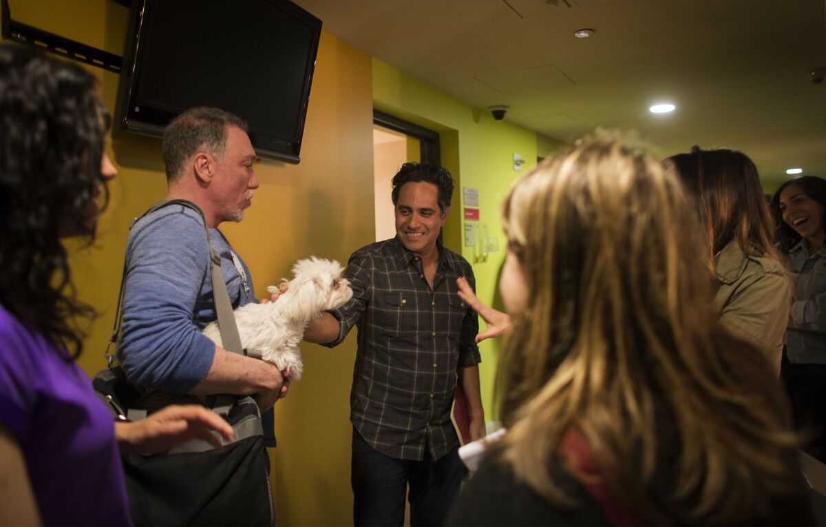 Patrick Page and his dog. (Gina Ferazzi / Los Angeles Times)