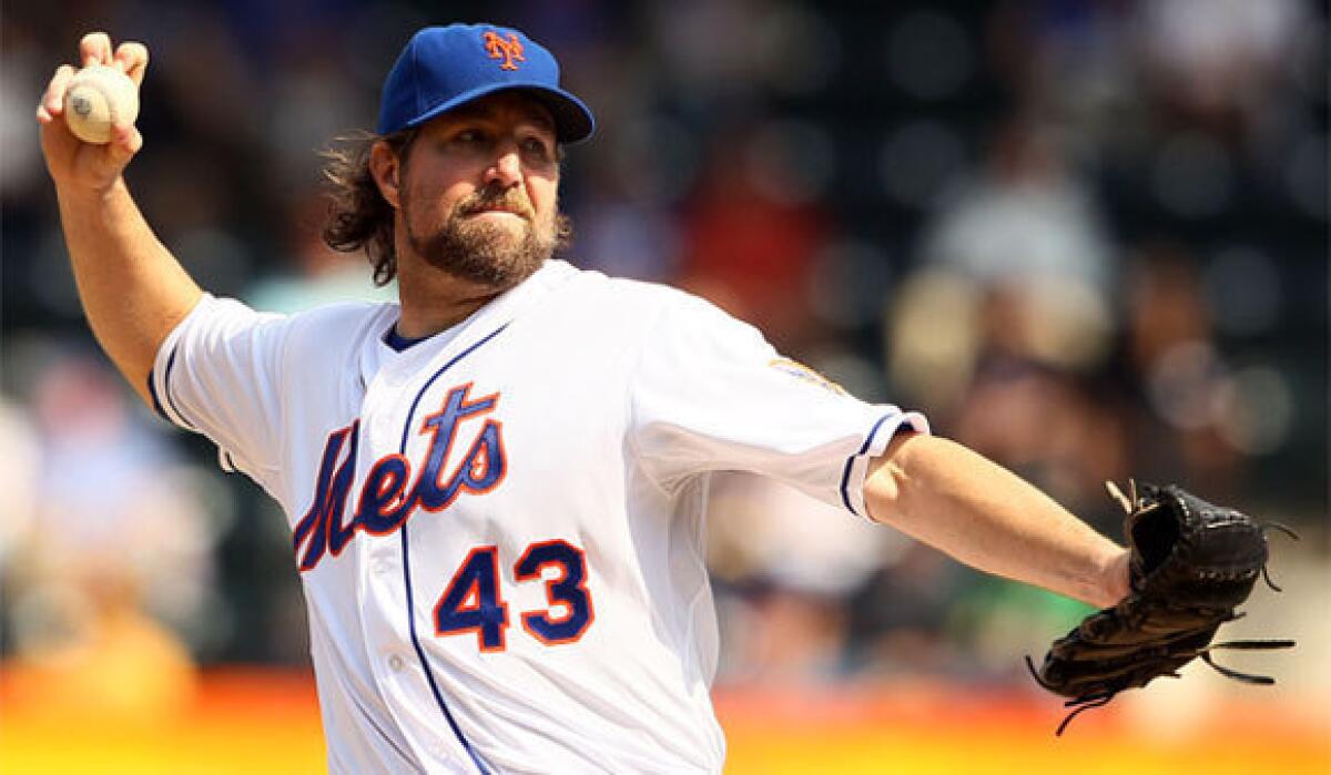 Mets pitcher R.A. Dickey became the first pitcher who relies primarily on the knuckleball to ever win the Cy Young Award on Wednesday.